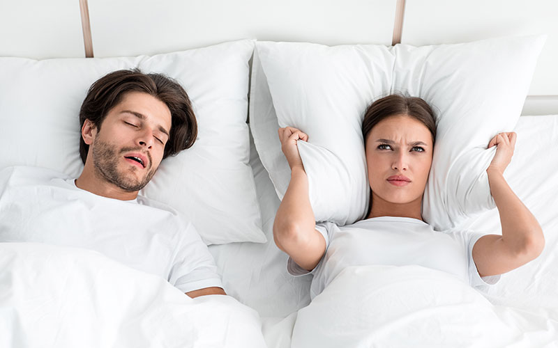 How can I tell if my snoring is a symptom of sleep apnea?       